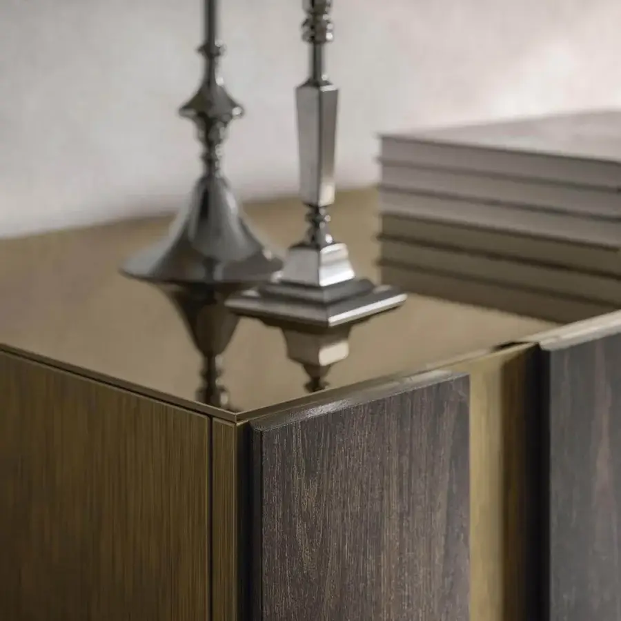 Distinguished Cattelan Italia Amsterdam sideboard crafted in alternating vertical Oxybrass slats with burnt oak inserts and curved steel feet