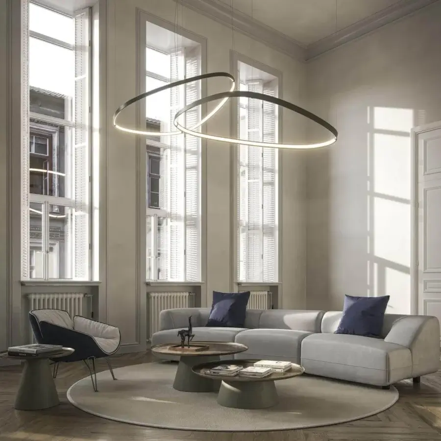 Distinguished Cattelan Italia Magellano Magnum suspension lamp with titanium steel and dark matte finish encircling a bright internal light source