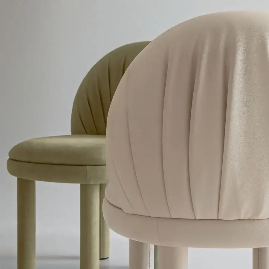 Superior Rugiano Fandango chair crafted in light beige leather with a matte finish and refined folds detailing