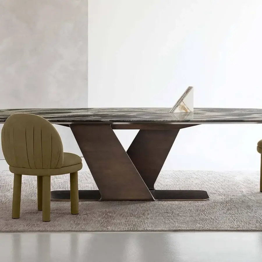 Exceptional Rugiano Fandango chair with soft lines and complete leather upholstery in muted olive-green with gold accents
