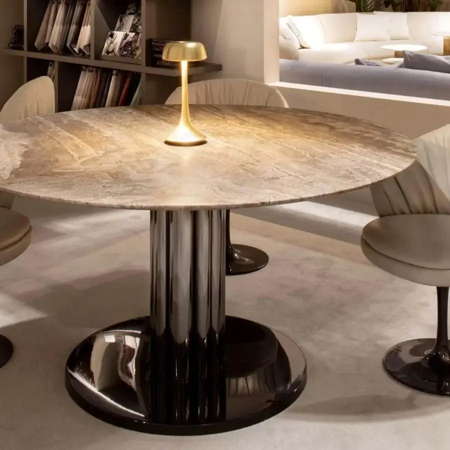 Sophisticated Rugiano Fandango armchair with curved silhouette, neutral textile upholstery and black chrome finished metal base