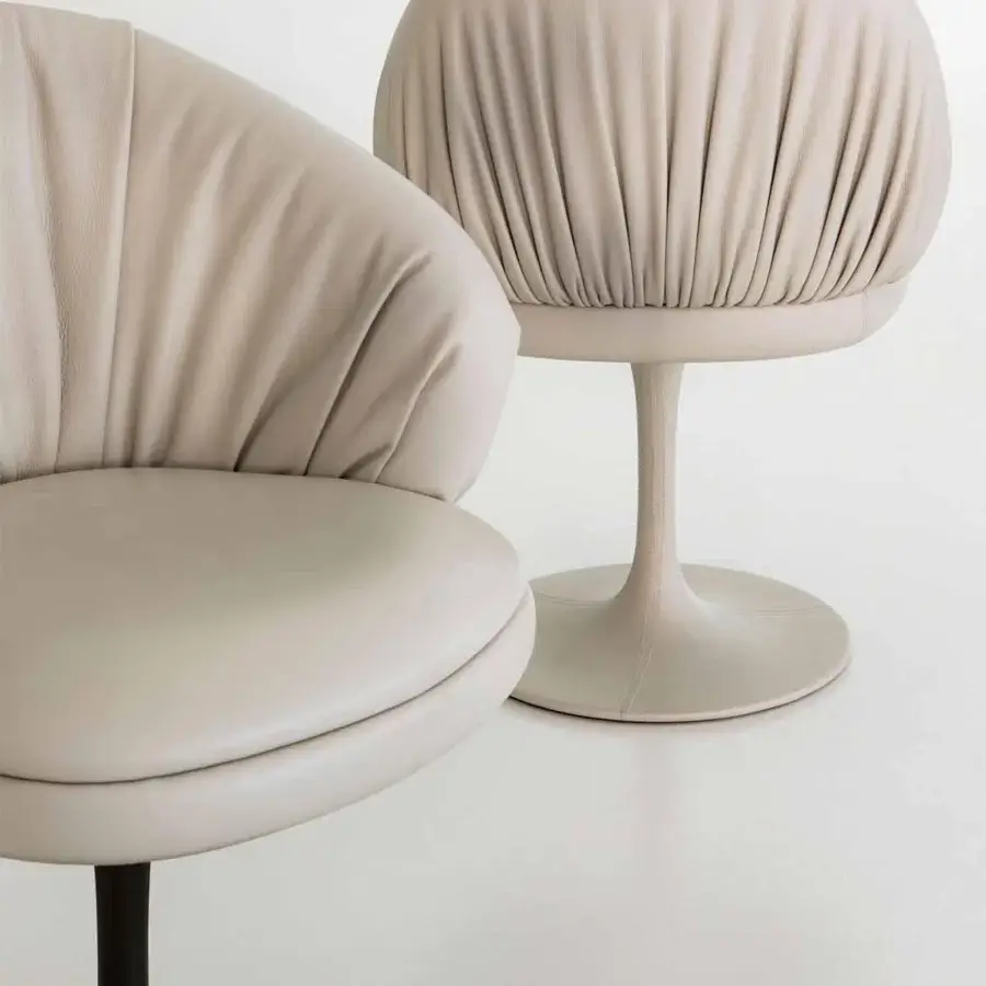 Exclusive Rugiano Fandango armchair with refined lines, light beige textile upholstery and black chrome finished metal base