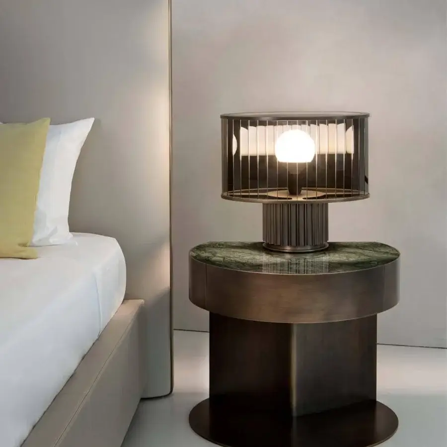 Superior Rugiano Inca nightstand with mottled green and brown marble top and varnished bronze metal base