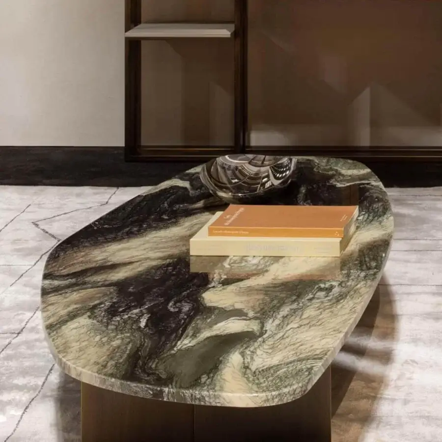 Exceptional Rugiano Rock coffee table with swirling dark green, black, and beige tones in a glossy marble finish and bronzed brass legs
