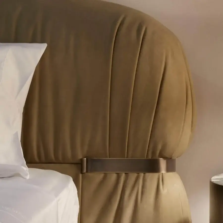 Exclusive Rugiano Fandango bed with enveloping lines and tan leather upholstery complemented by a bronzed brass metal frame
