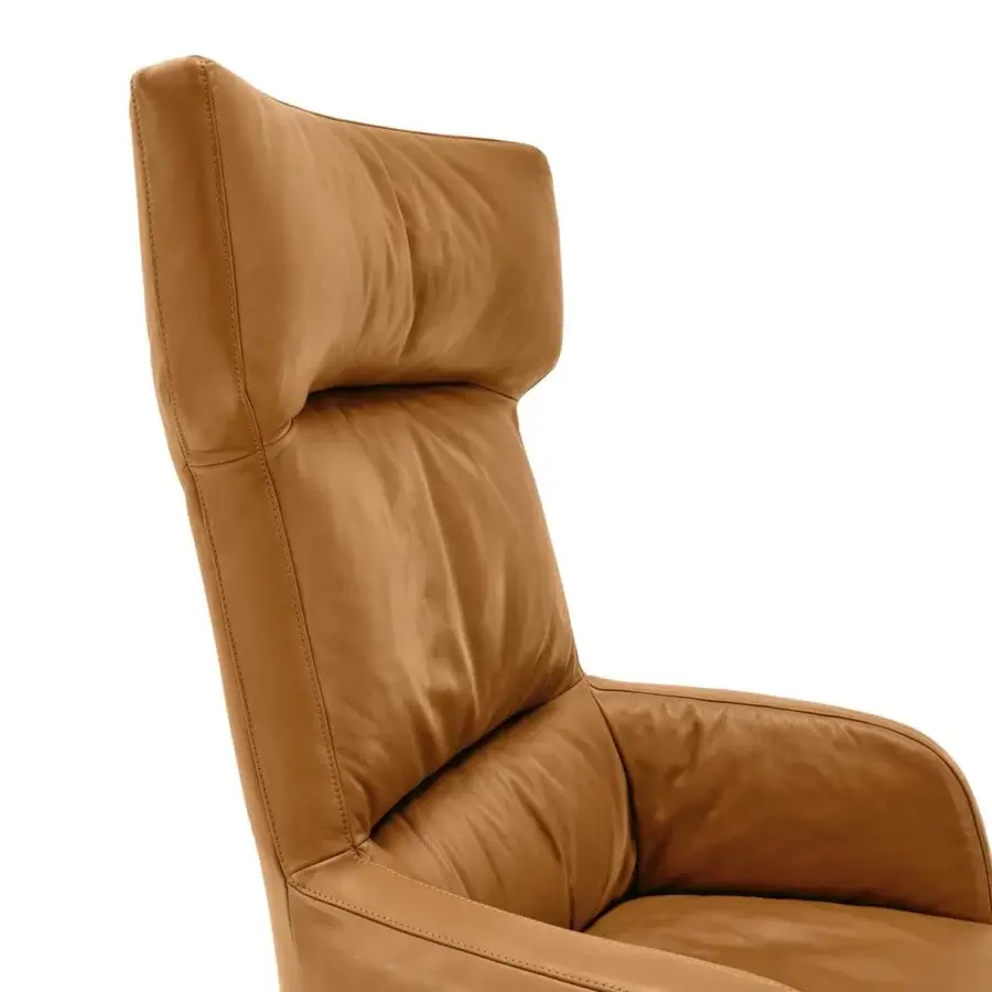 Distinguished Arketipo Forbes armchair with tan leather upholstery and vertical stitched seams offering adjustable ergonomic design