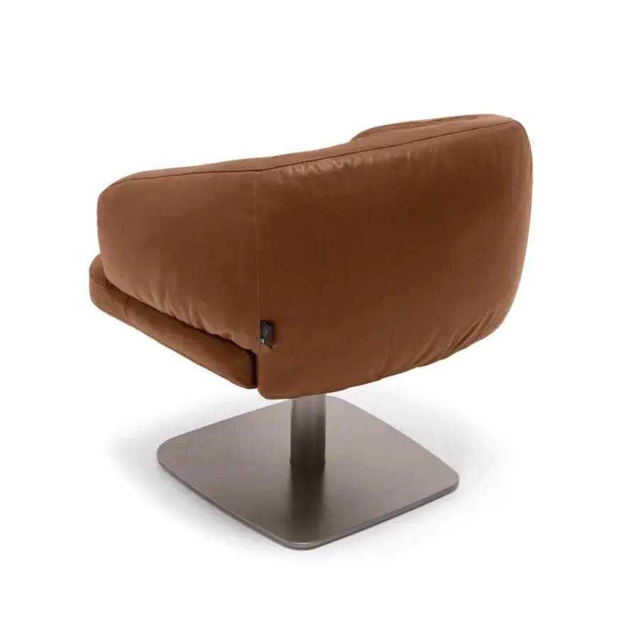 Elegant Arketipo Warren lounge chair with supple leather upholstery and smooth matte finish invites relaxation with a swivel base