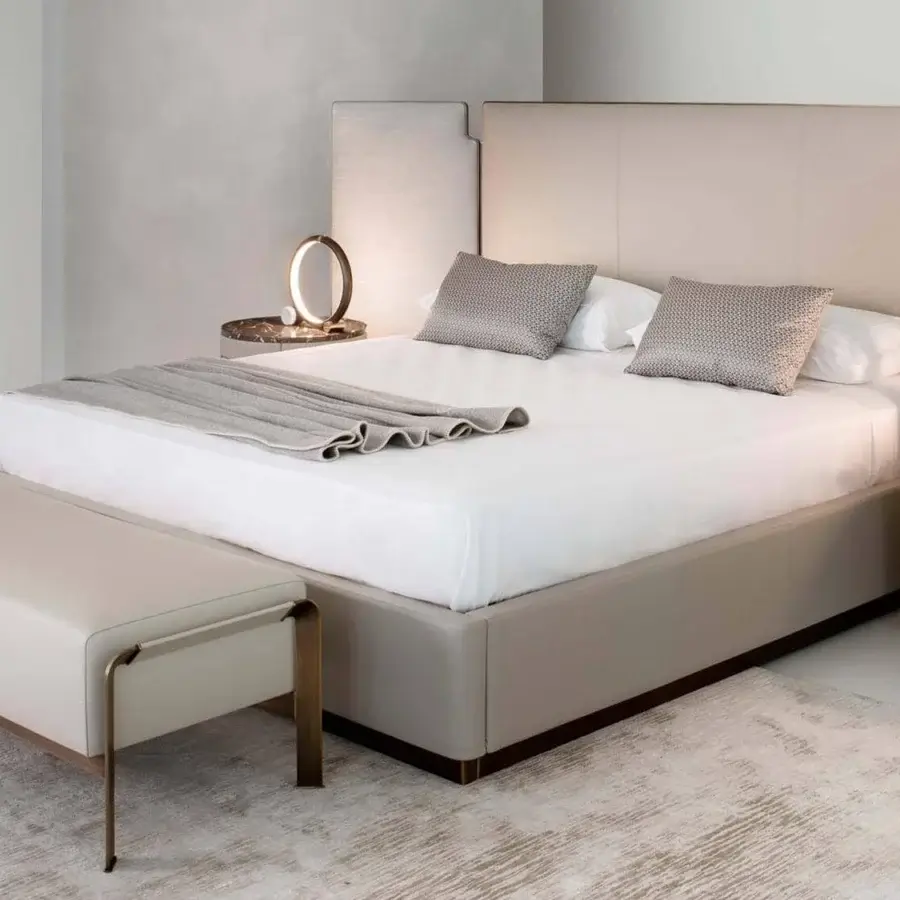 Distinguished Rugiano Falcon bed with light beige fabric upholstery and bronze brass finish metal details