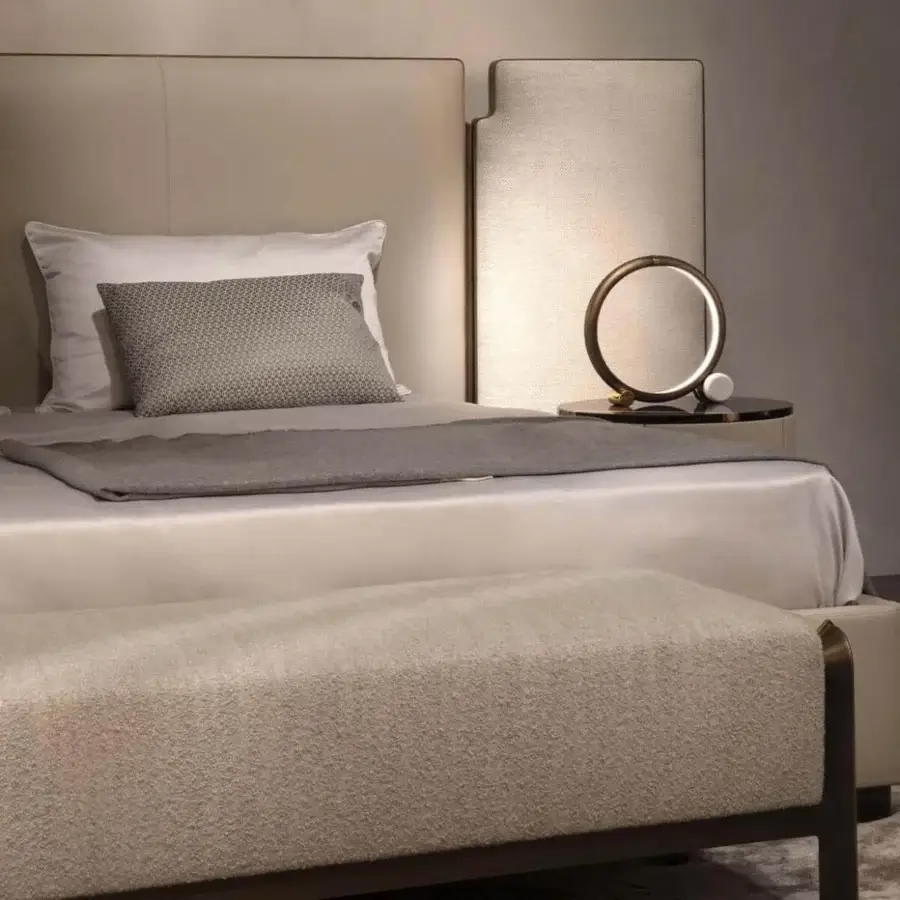 Superior Rugiano Falcon bed with light beige textile upholstery and bronze brass refined metal frame