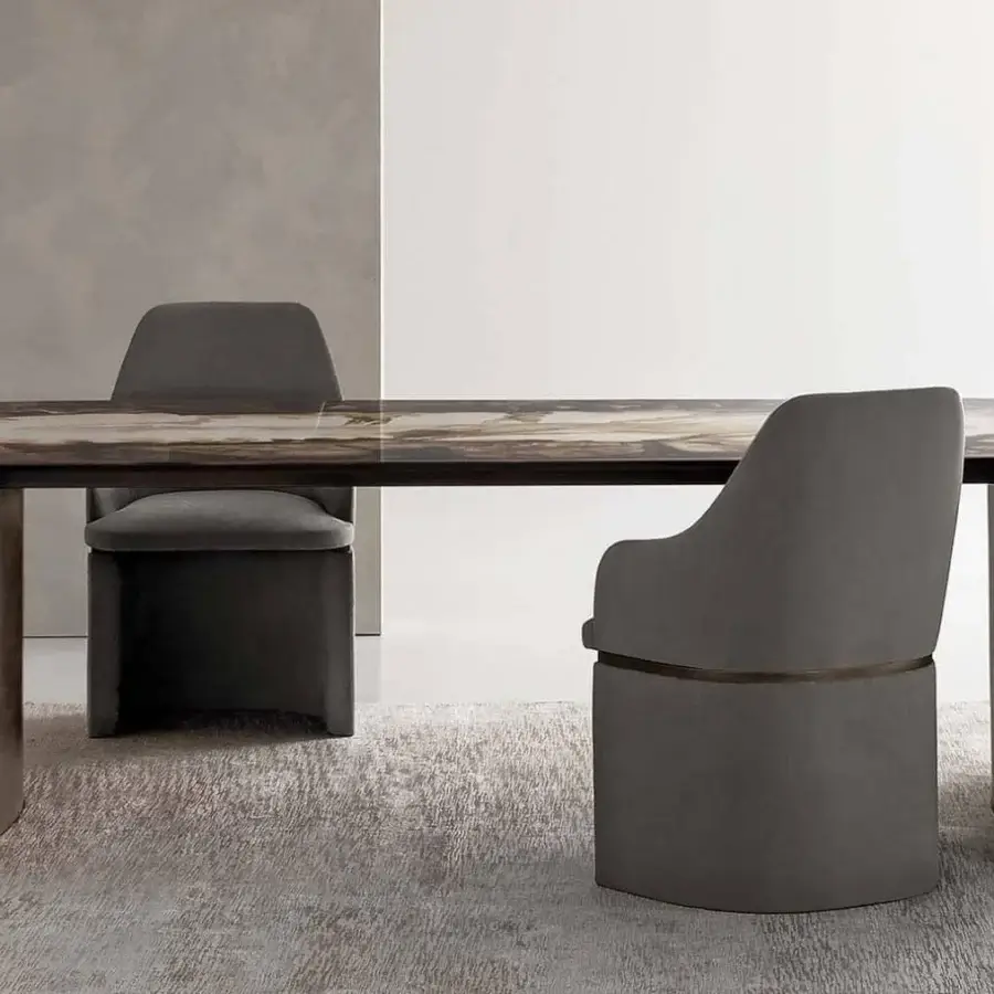 Distinctive Rugiano President table with rounded marbled tabletop and matte varnished bronze curved legs