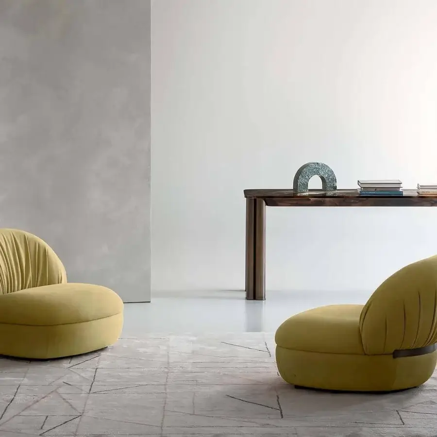 Exceptional Rugiano Fandango lounge chair crafted in Italy with plush olive-green leather and bronze brass metal band