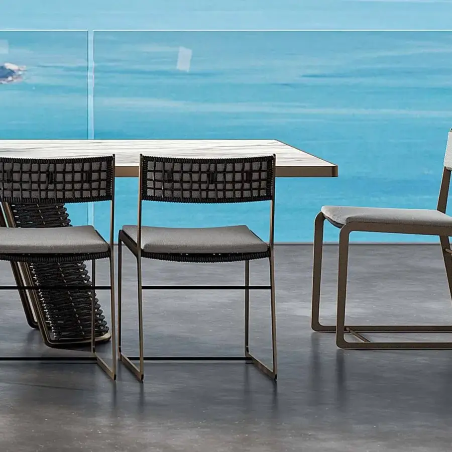Exclusive Rugiano Atena chair with outdoor bronze aluminum and hand-braided grey rope with gray textile cushioning
