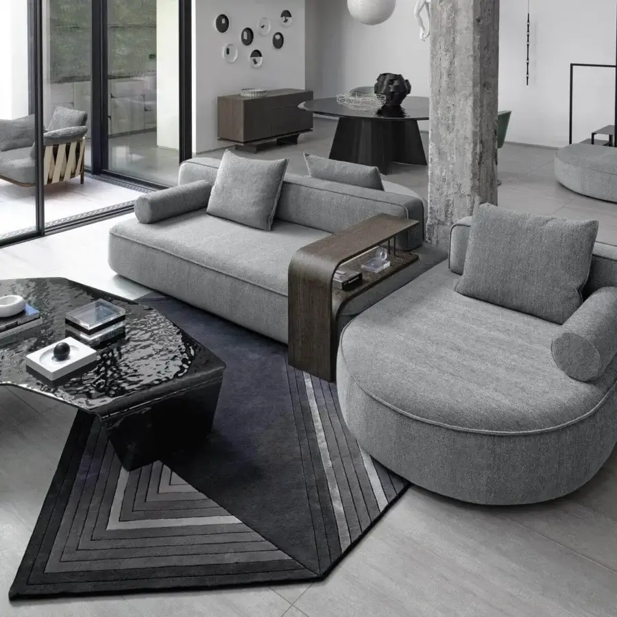 Innovative Arketipo Back Pack sectional with light gray woven upholstery and a wooden side table extension