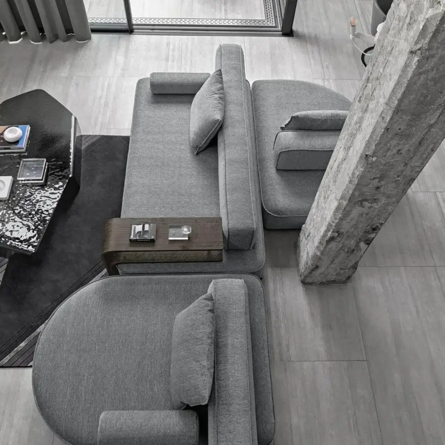 Distinguished Arketipo Back Pack sectional with matte grey textile upholstery and a curved modular design built with a wooden side table