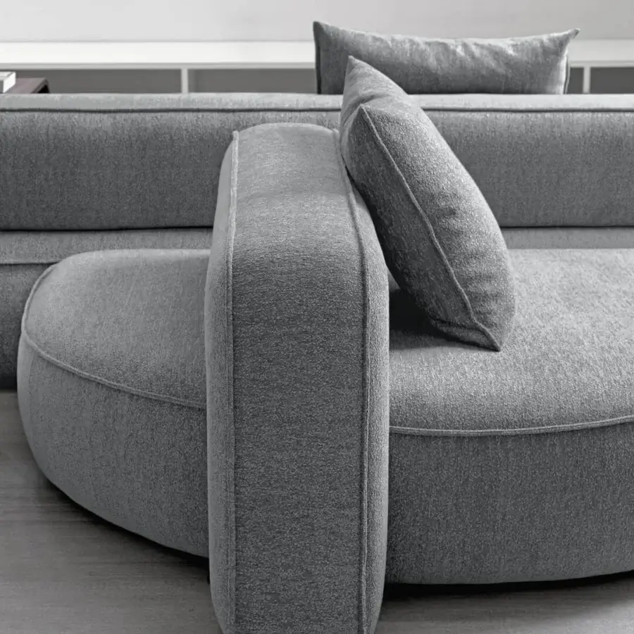 Innovative Arketipo Back Pack sectional in soft matte gray textile with clean curved lines and plush cushions