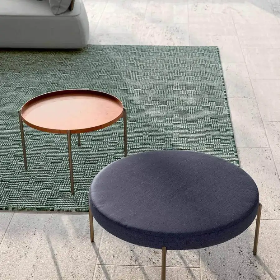 Distinguished Rugiano Apollo ottoman with dark blue-gray woven fabric and refined Bronze metal legs