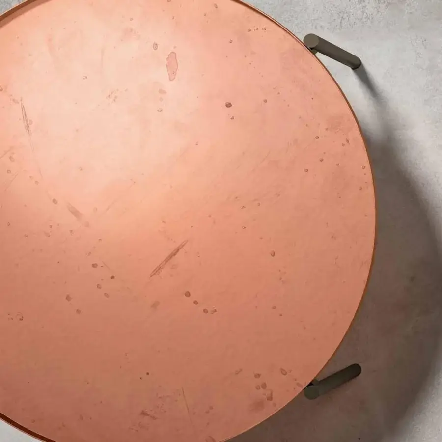 Sophisticated Rugiano Apollo coffee table with round copper tray and muted bronze metal legs crafted with a matte finish