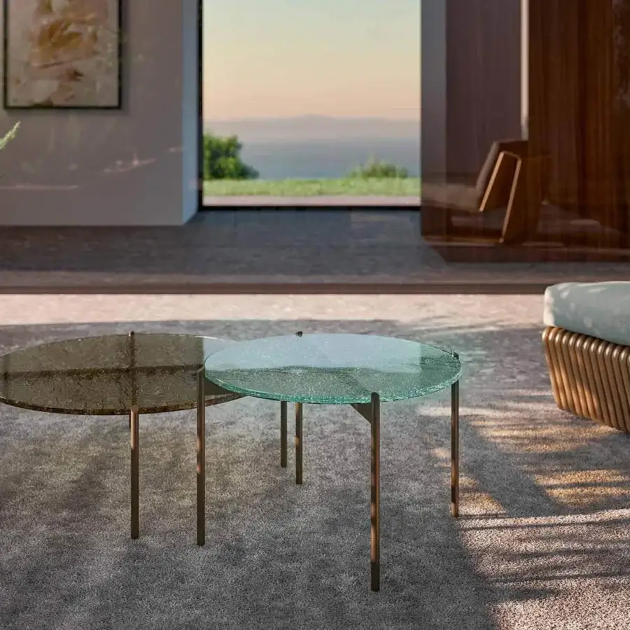 Distinctive Rugiano Apollo coffee table with round bronze fused glass and refined metal legs in bronze finish