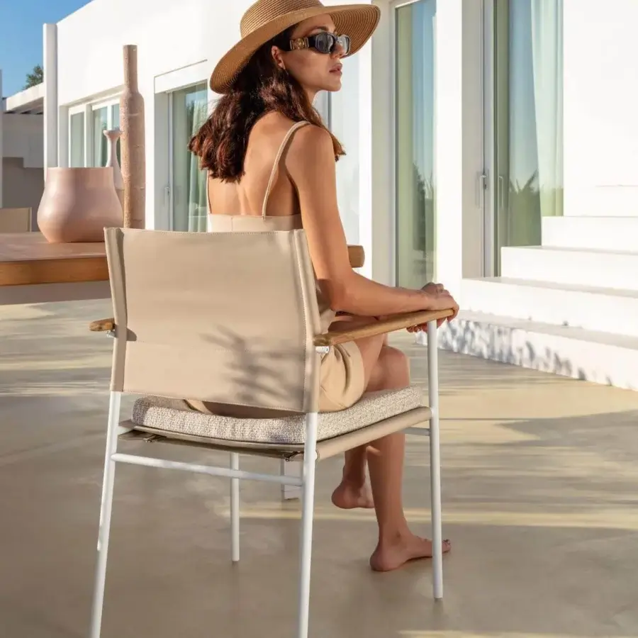 Distinguished Talenti Allure armchair with matte white steel frame and beige eco-leather cushions crafted for comfortable contrast