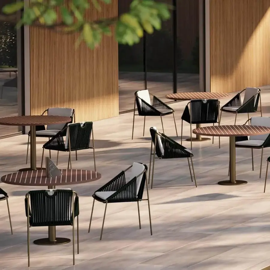Superior Rugiano Demetra armchair with woven light-toned rope and a gray seat cushion crafted for outdoor use