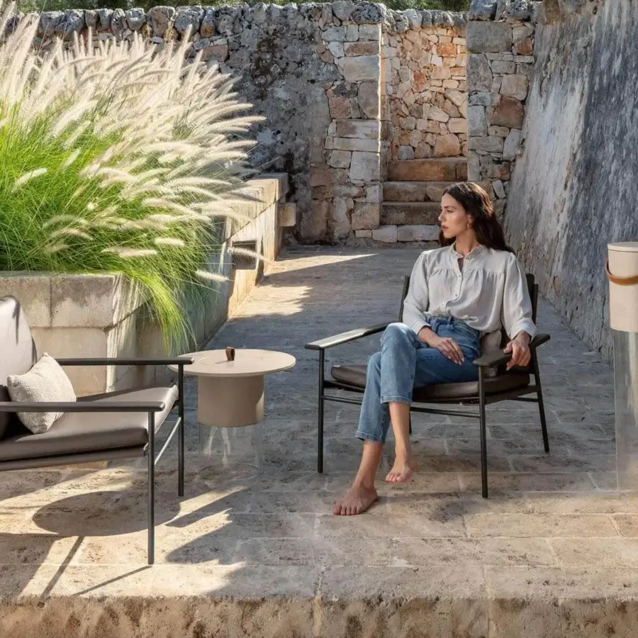 Exclusive Talenti Allure lounge chair with dark gray steel and eco-leather, plus wooden finishes and a light cushion