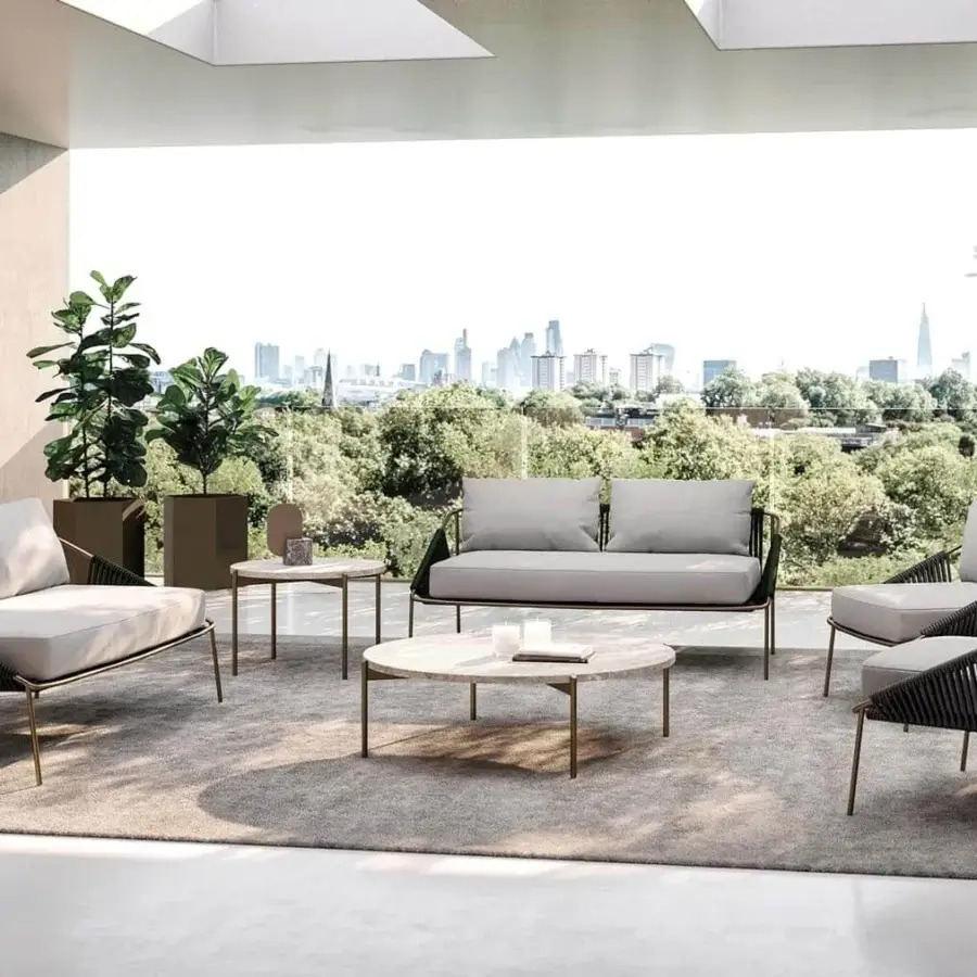 Exceptional Rugiano Demetra lounge chair with dark braided rope, light gray fabric cushions and a metal structure