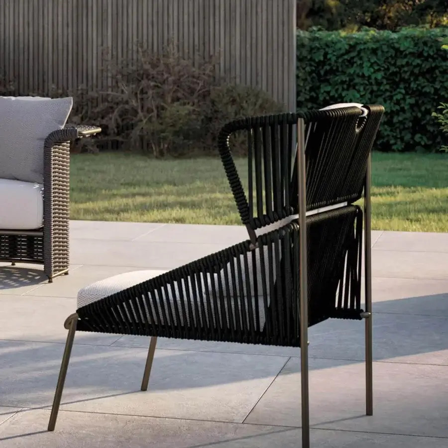 Superior Rugiano Demetra lounge chair with bronze metal structure and light textile cushions woven with hand-braided rope