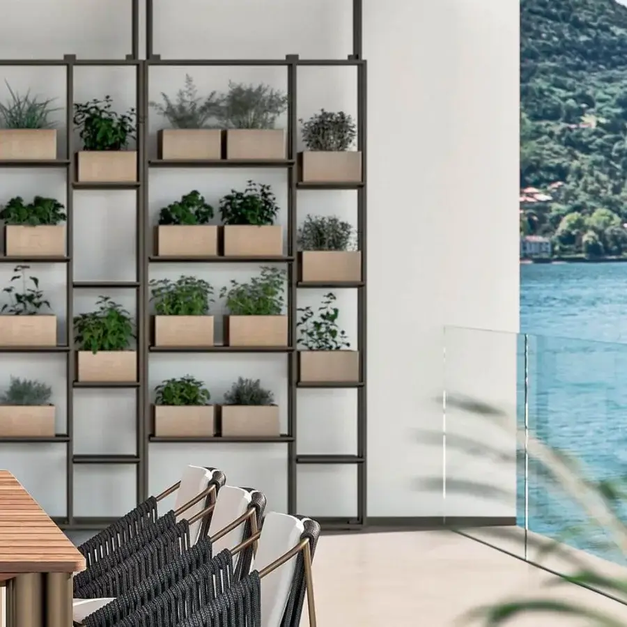 Exceptional Rugiano Garden plant shelf with a grid-like metal framework and light brown shelves crafted in an outdoor bronze finish