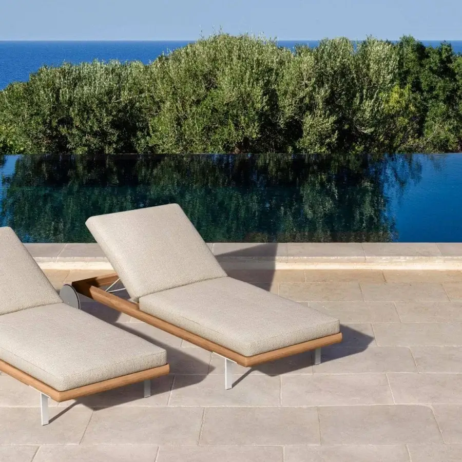 Superior Talenti Allure lounger with accoya wood and aluminum structure, light-toned fabric covers, plus bright white metal support