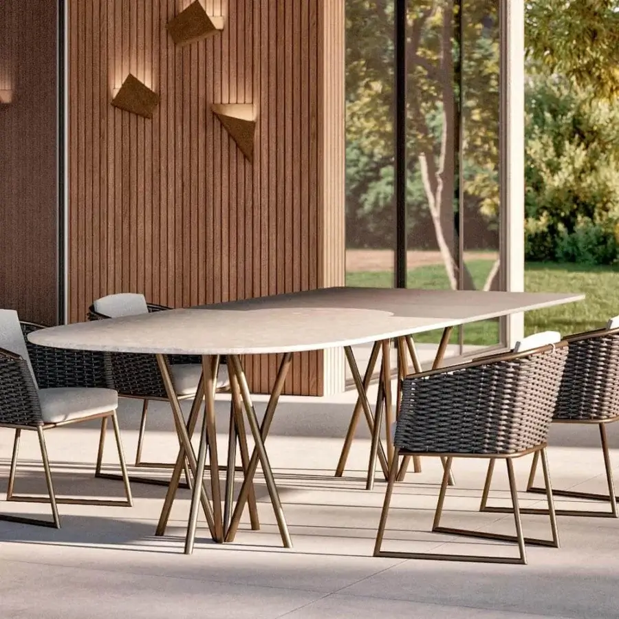 Exceptional Rugiano Mikado table with a semioval top combining ceramic and marble finishes, supported by a bronze tubular iron base