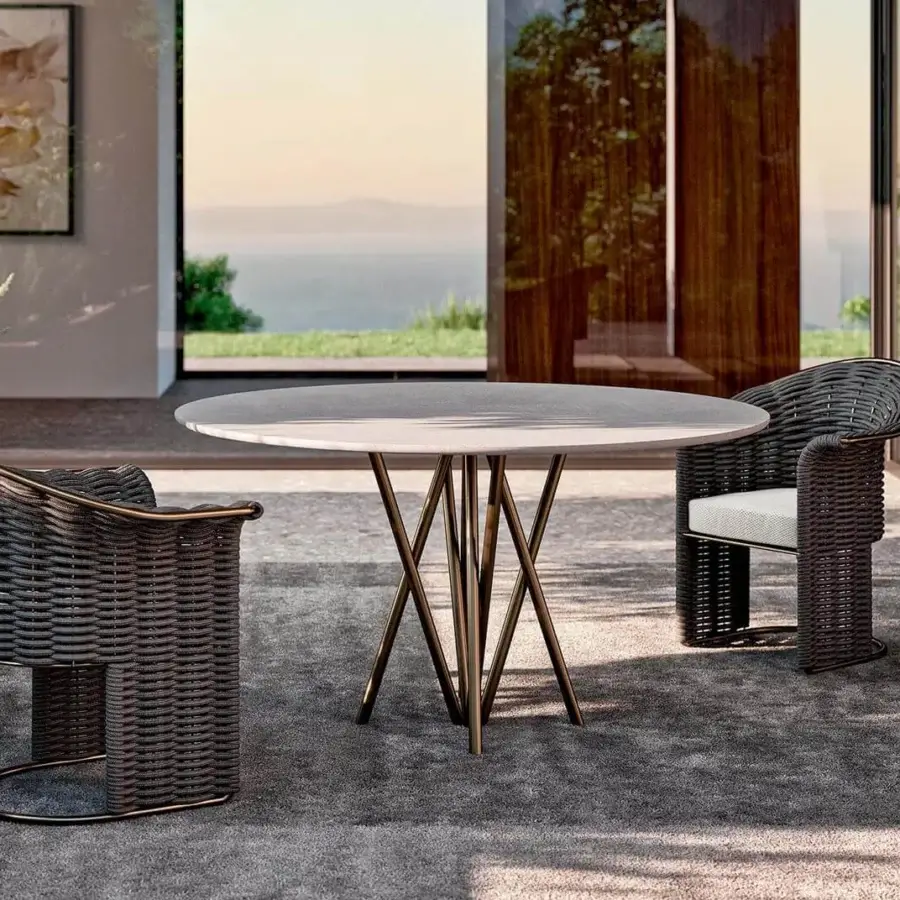 Distinguished Rugiano Mikado table with a light gray ceramic top and crisscross bronze tubular iron base