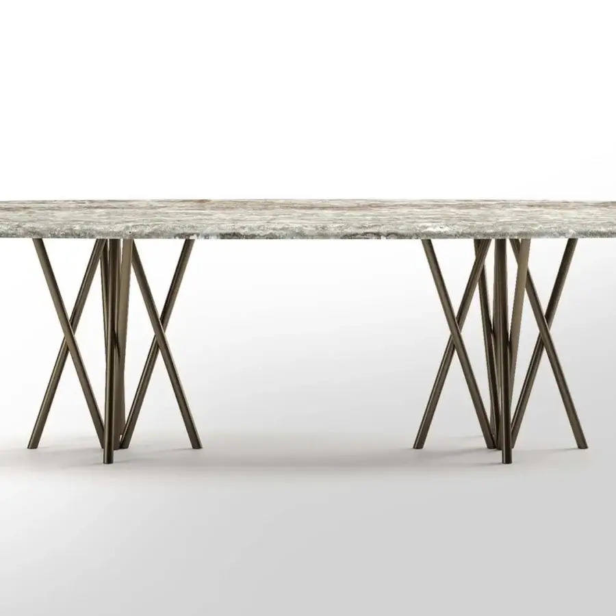 Exclusive Rugiano Mikado table crafted with mottled grey and beige ceramic and bronze tubular iron in an intersecting base
