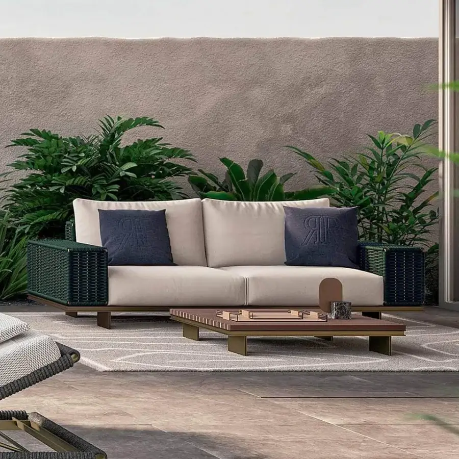 Superior Rugiano Memphis sofa with bronze metal and hand-braided green rope, upholstered in light fabric with navy cushions