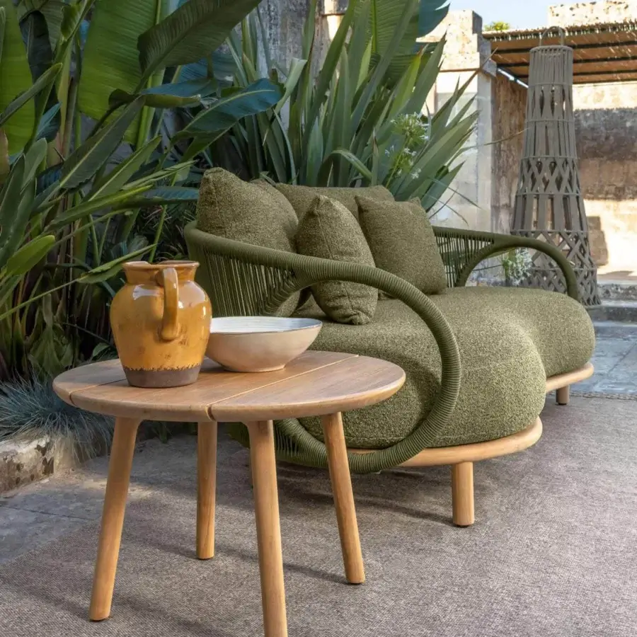 Lavish Talenti Karen sofa with tribal aesthetic, light-toned wood frame, and green textile weaving details