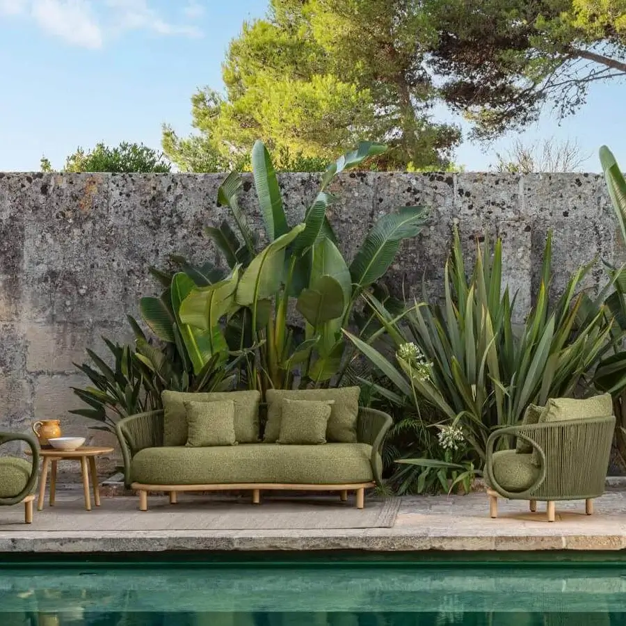 Superior Talenti Karen sofa with tribal aesthetic, light-toned wood frame, olive-green upholstery and matte finish