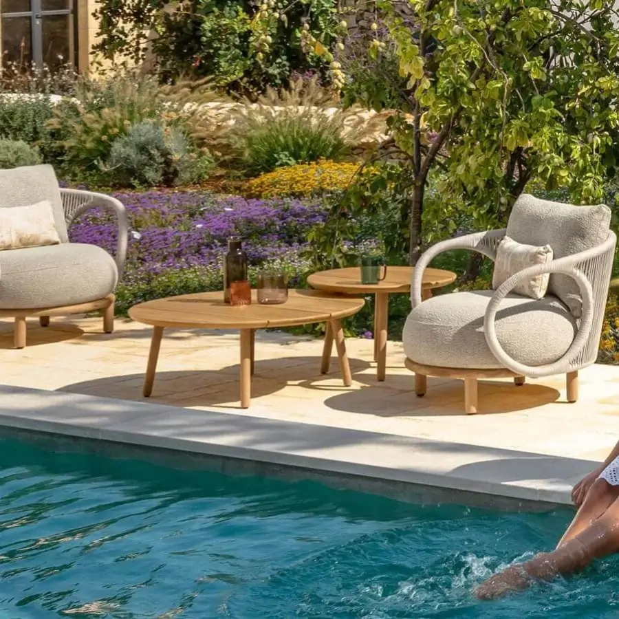 Lavish Talenti Karen lounge chair with rope detailing and plush beige cushions crafted in Italy with wooden legs