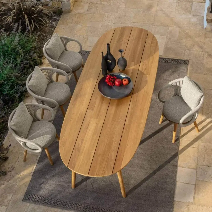 Exceptional Talenti Karen armchair with graceful curves, ring armrests and warm gray textile upholstery crafted in Italy