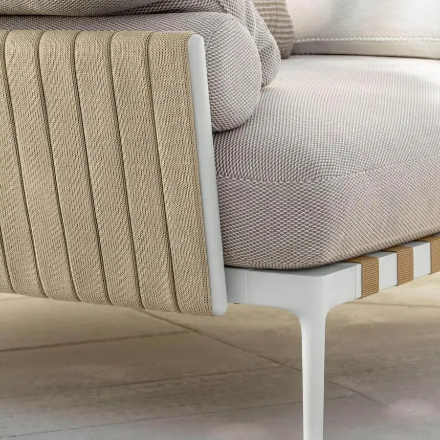 Elegant Talenti Salinas lounge chair with woven beige textile upholstery and light-colored frame construction