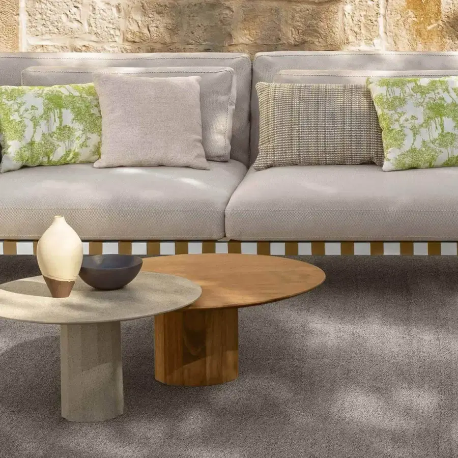 Elegant Talenti Salinas coffee table with neutral concrete-like top and cylindrical base exhibiting a matte finish