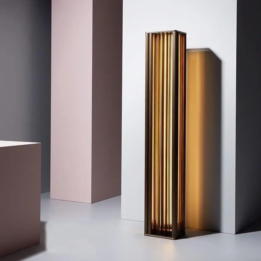Superior VENICEM Numa floor lamp with dark burnished brass and warm golden-bronze ribbed cylindrical elements