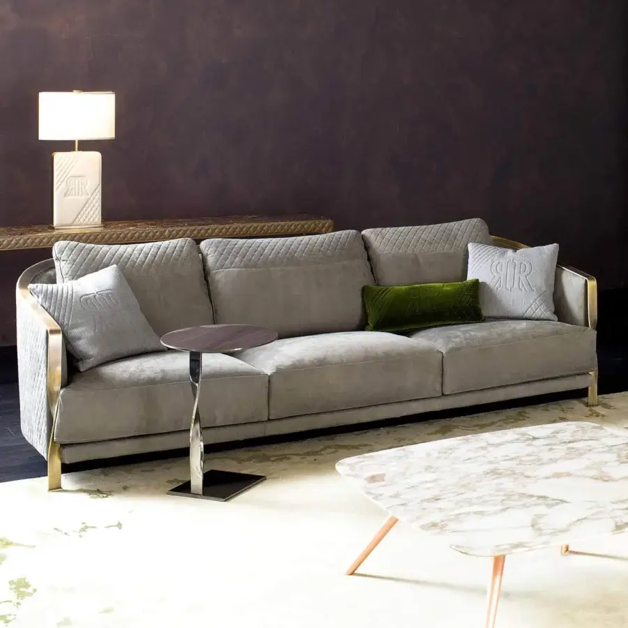 Exceptional Rugiano Paris sofa upholstered in muted grey fabric with matelassé embroidery and twisted gold-toned metal base