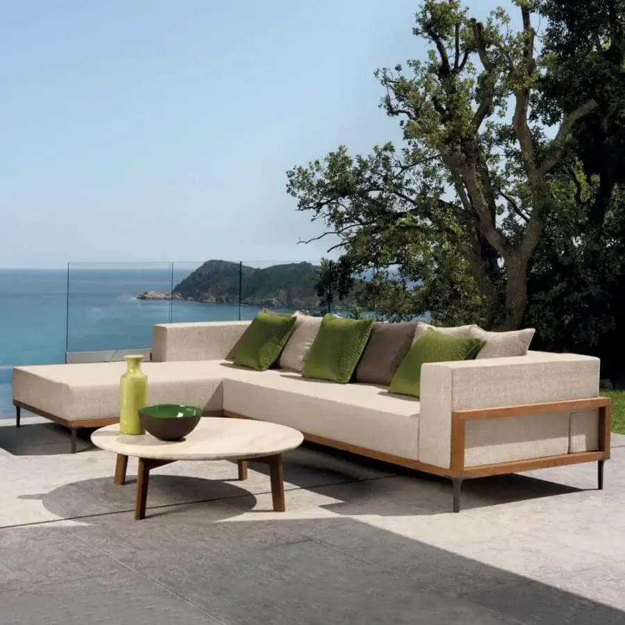 Sophisticated Talenti Cleo sectional with teak wood frame and light beige textured fabric upholstery, satin finish