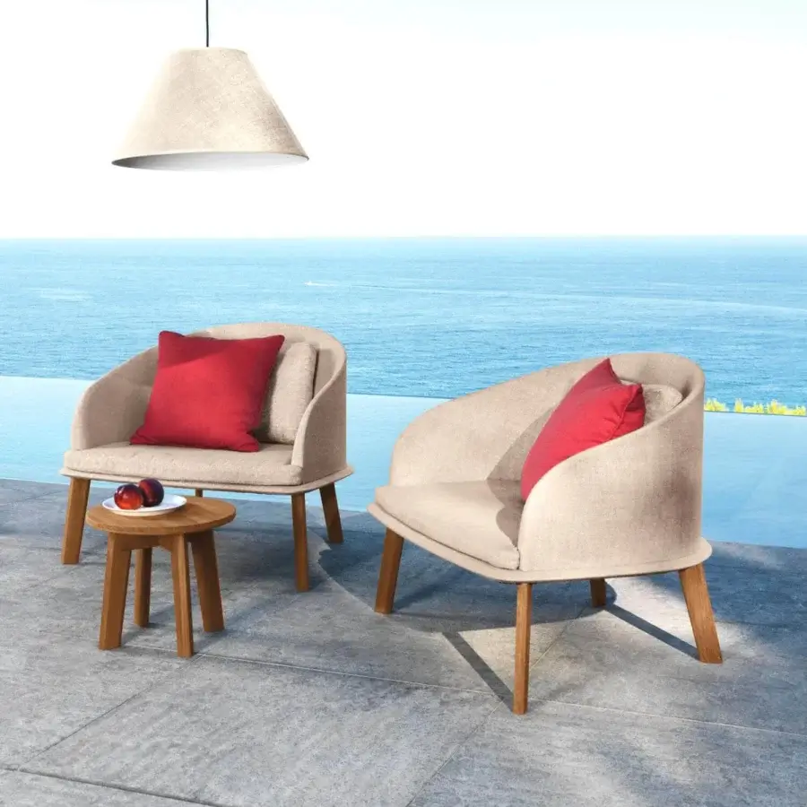 Distinguished Talenti Cleo lounge chair with a high-end wood structure and neutral beige textured fabric complemented by vibrant red cushions