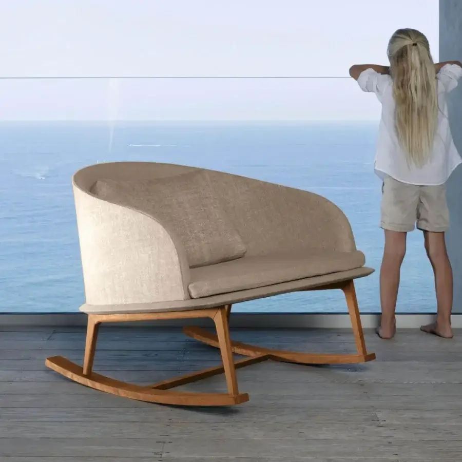 Harmonious Talenti Cleo rocking lounge chair crafted with a satin wood structure and refined beige textile upholstery