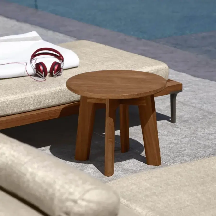 Distinguished Talenti Cleo side table crafted in natural teak wood with a warm medium-toned brown hue and rounded form