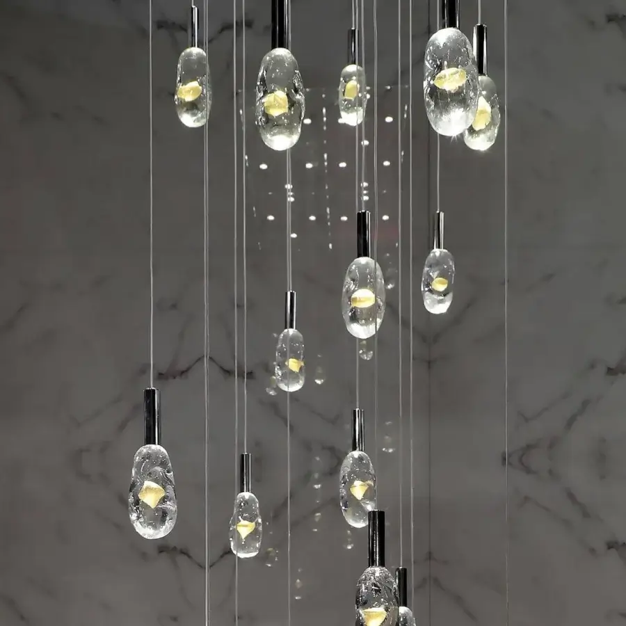 Stunning Reflex Sassi suspension lamp with mirror glass support and cascading transparent plus gold Murano glass pendants