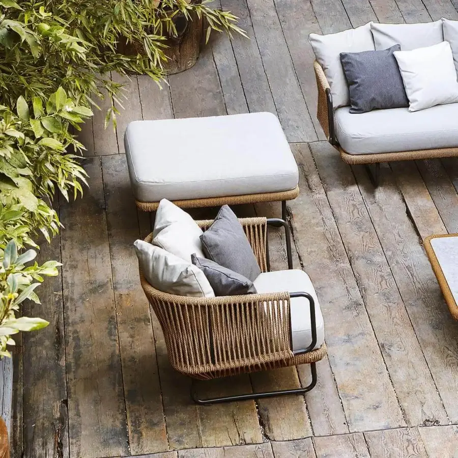 Exceptional Varaschin Babylon ottoman with aluminum frame woven in synthetic fiber rope and plush white cushion