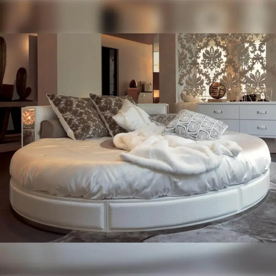 Innovative Rugiano Venus bed crafted in textured matte white leather with mirrored panels and decorative stitching