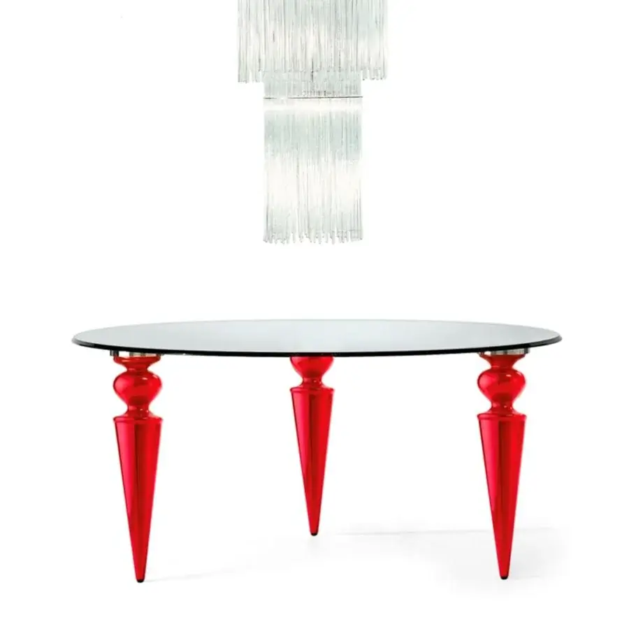 Exceptional Reflex Gran Canal table with transparent glass and dramatically sculpted red finished legs