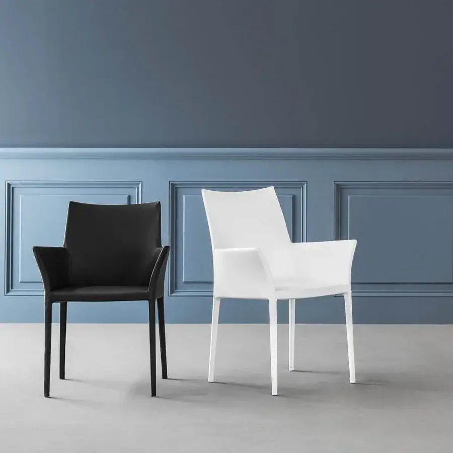 Distinguished Bonaldo Kayla chair with geometric molded shell and slender metal legs in matte finish